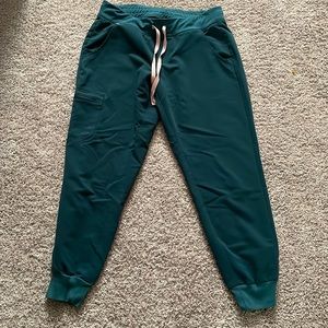 Gently used green figs joggers! Pink tie!